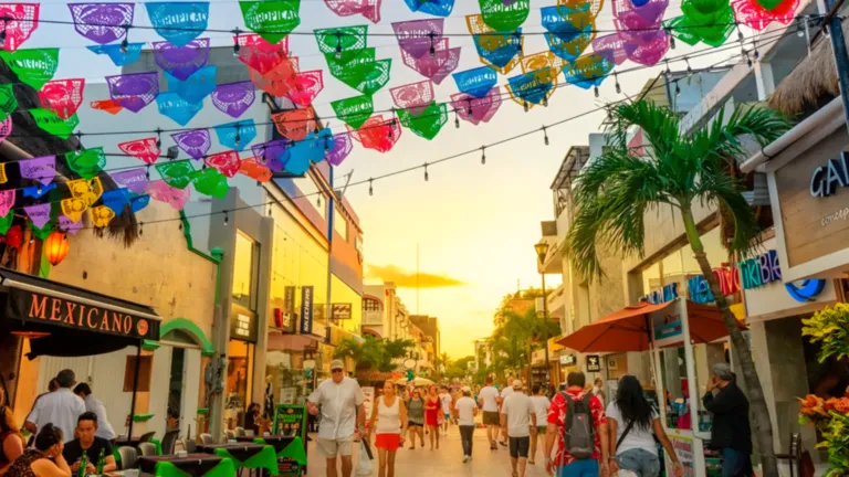 Beautiful beach in Playa del Carmen with turquoise water and palm trees in Riviera Maya Mexico